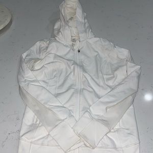 White lululemon jacket with hoodie and thumb loop